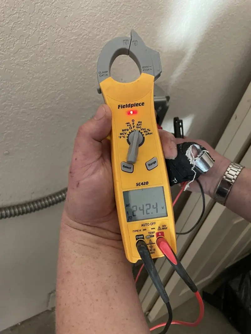 Voltage testing with clamp meter during Hot Tub / Pool Electrical Wiring in Chautauqua